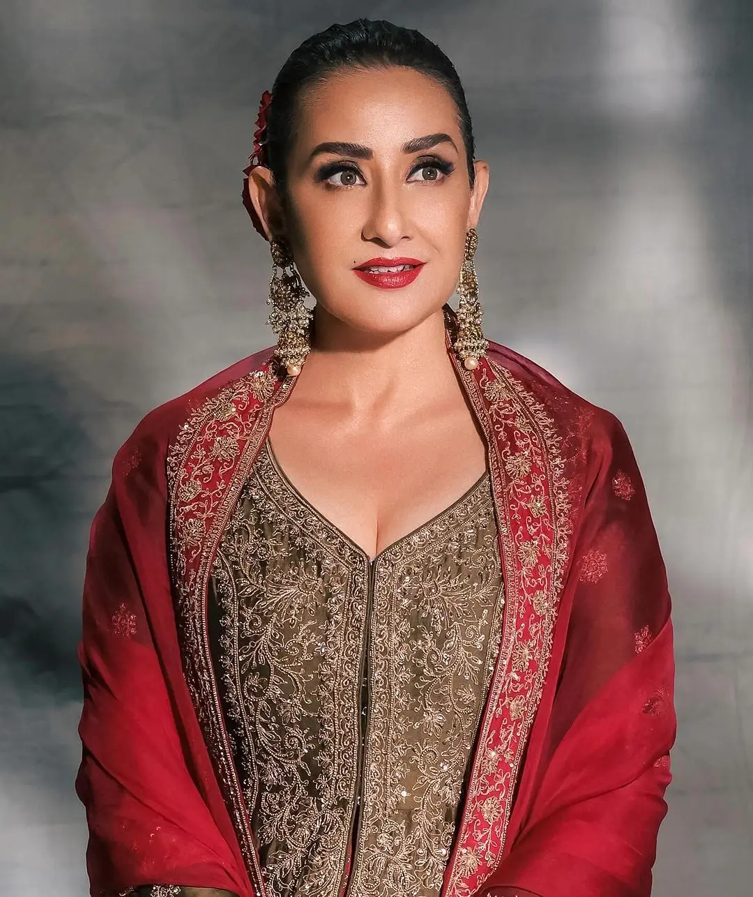 Bollywood Actress Manisha Koirala Stills in Red Dress